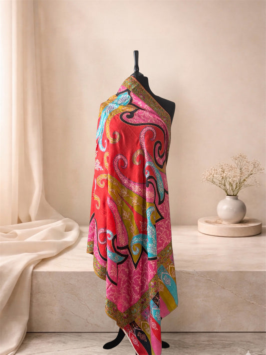 Kalamkari pashmina shawl with hand-painted multicolour paisleys and Sozni embroidery draped on a mannequin, side view