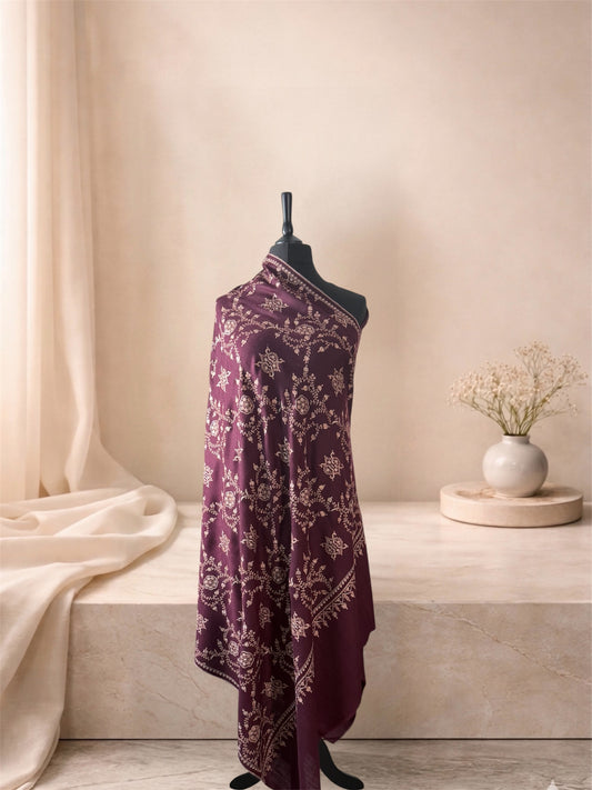 Plum pashmina shawl with ivory Sozni floral medallion jaal draped on a mannequin, side view