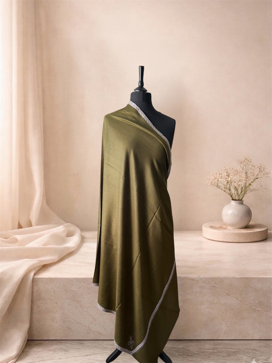 Olive green pashmina shawl with silver-white border draped on a mannequin, side view