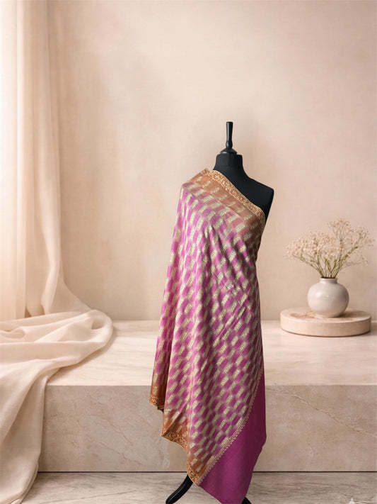 Orchid pink ikat check pashmina shawl draped on a mannequin, side view