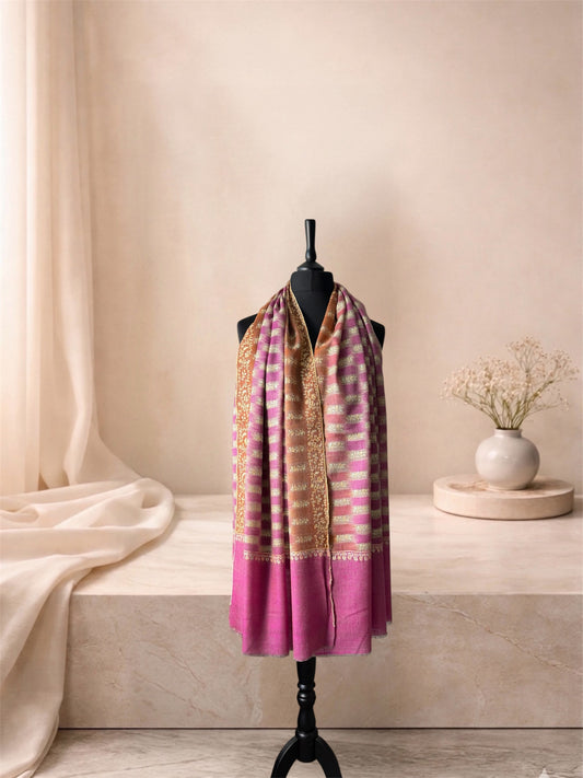 Orchid pink ikat check pashmina shawl with amber band worn over the shoulders, front view