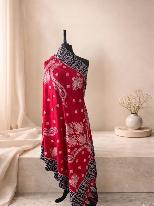 Kalamkari red and black pashmina shawl with Sozni floral embroidery draped on a mannequin, side view