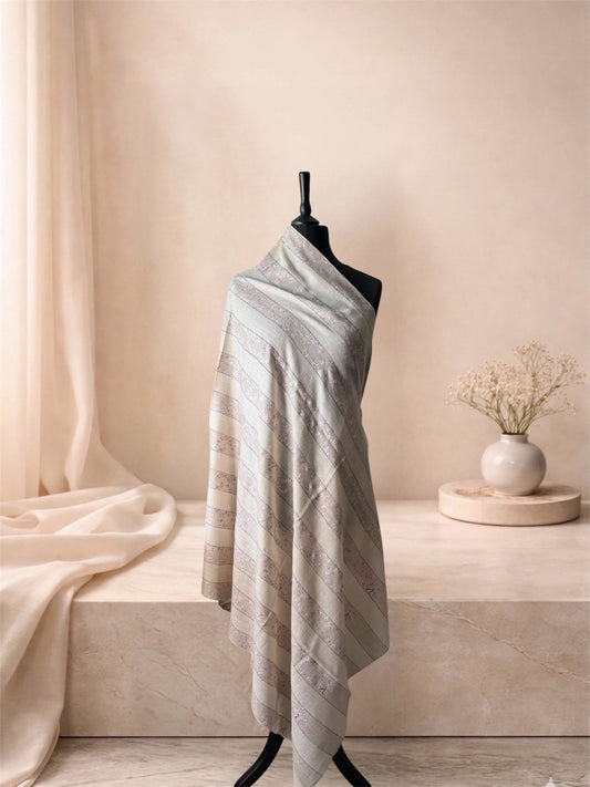 Natural striped pashmina shawl with lilac vine bands draped on a mannequin, side view