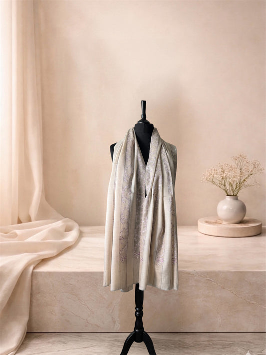 Natural striped pashmina shawl with lilac Sozni embroidery worn over the shoulders, front view