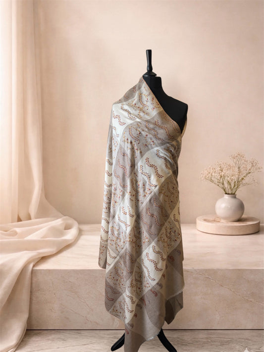 Taupe and ivory checked pashmina shawl with embroidered sprigs draped on a mannequin, side view
