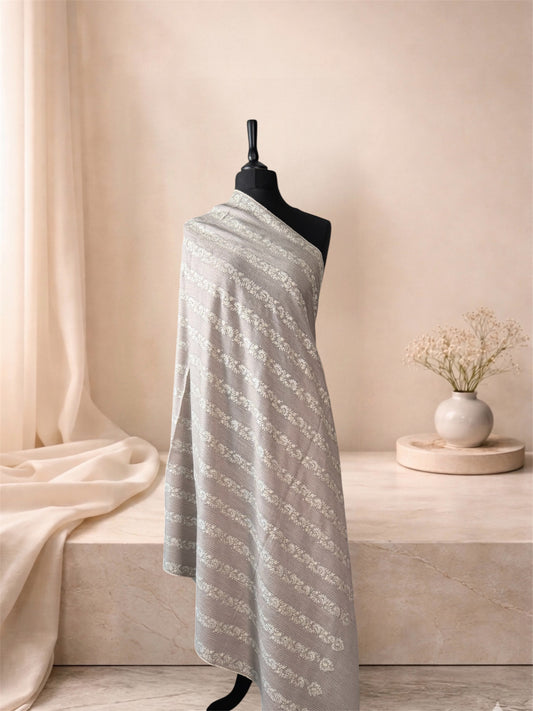 Taupe pinstripe pashmina shawl with ivory floral stripes draped on a mannequin, side view