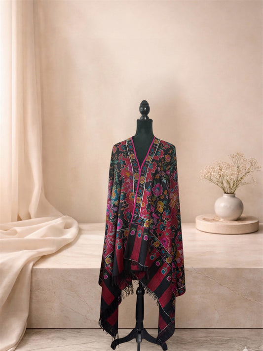 Black and crimson Kani pashmina shawl with striped ends worn over the shoulders, front view
