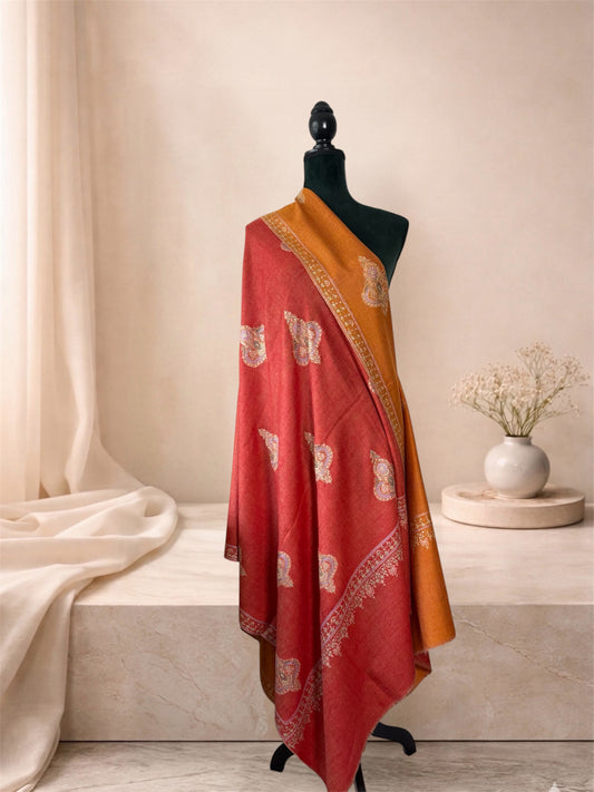 Mustard and brick red two-sided pashmina shawl with Sozni buta draped on a mannequin, side view