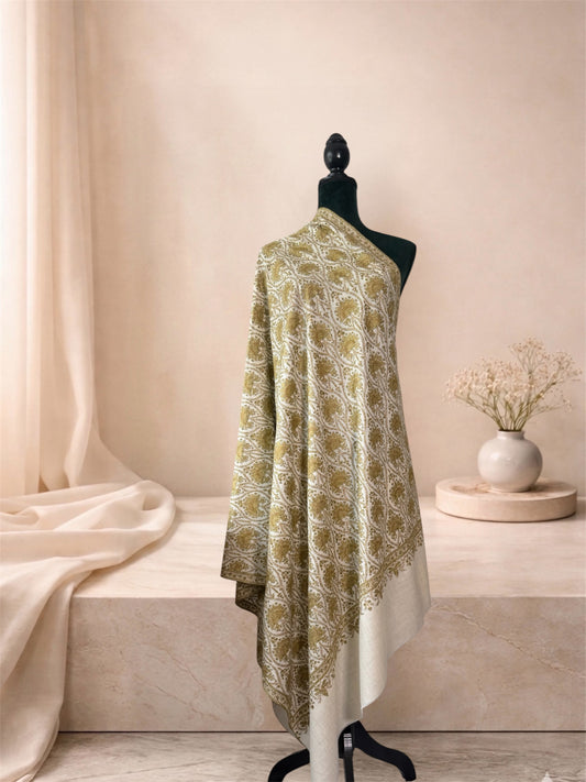 Ivory pashmina shawl with olive gold Sozni floral jaal draped on a mannequin, side view