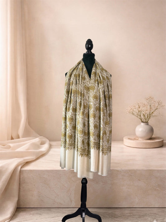 Ivory pashmina shawl with olive gold embroidery and plain ivory ends worn over the shoulders, front view