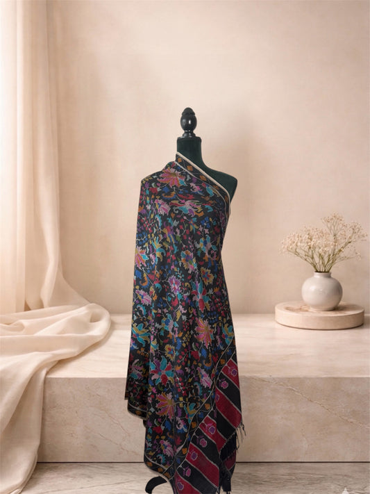 Black Kani pashmina shawl with multicolour floral jaal draped on a mannequin, side view